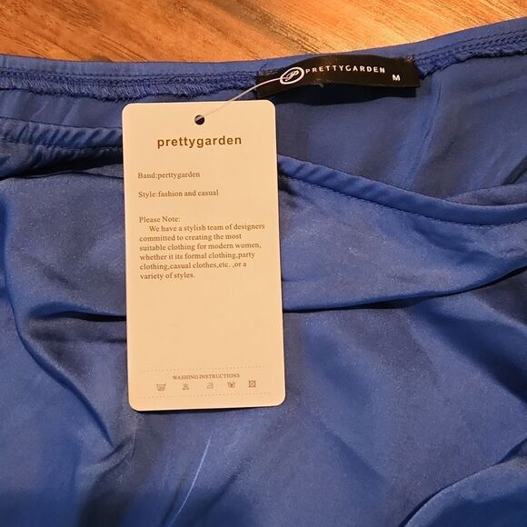 5/$15 Pretty Garden New with tag, women's medium royal blue asymmetric dress - Picture 5 of 6